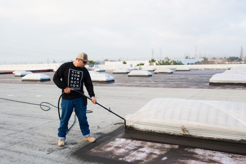 CIG construction Team repairing a roof