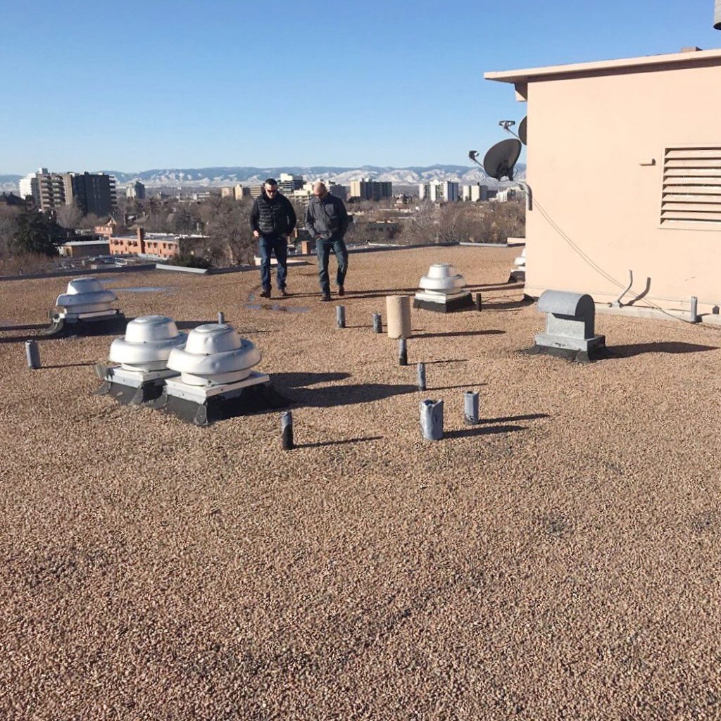 CIG Construction Tar and gravel roof coating CIG Construction